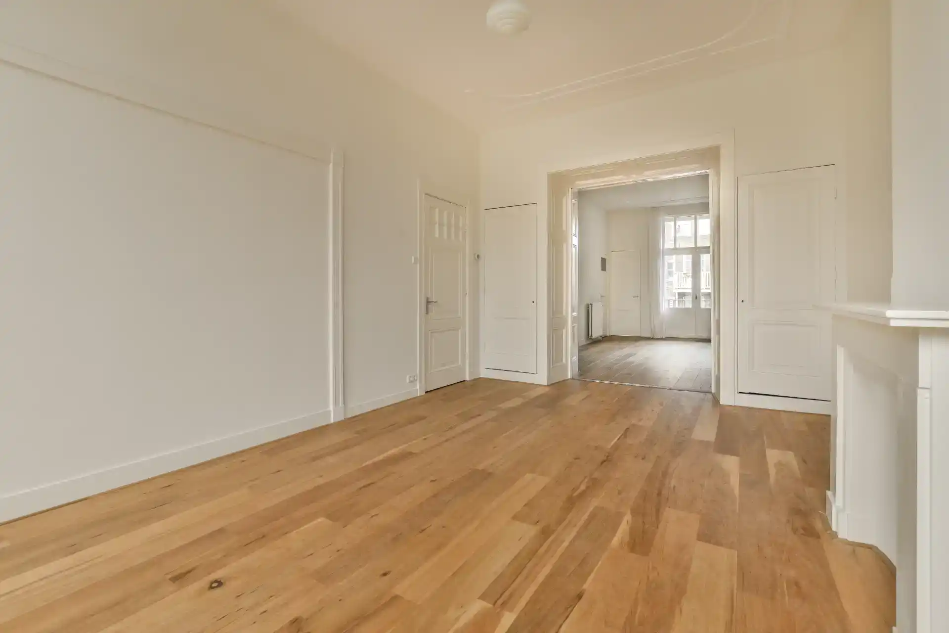 Mesterlige trægulve monteret af LH Tømrerfirma ApS, specialister i professionel tømrer- og gulvlægning.